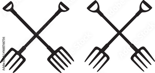 Two crossed pitchforks silhouette