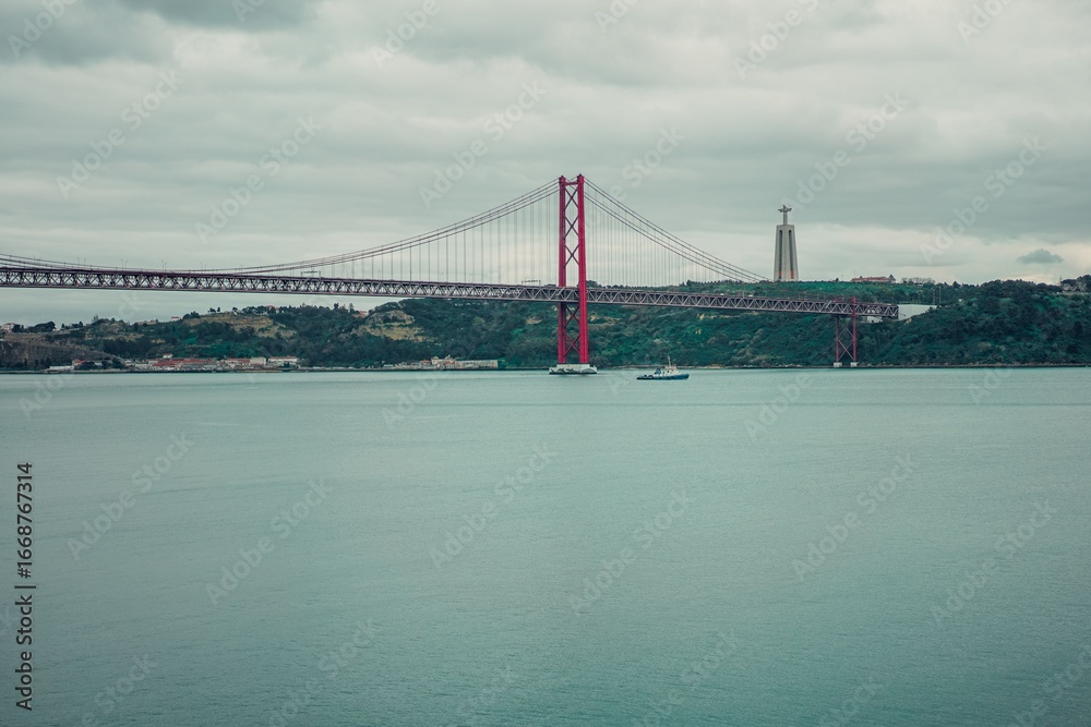 Fototapeta premium Scenic view of the 25 de Abril Bridge in Lisbon, Portugal.