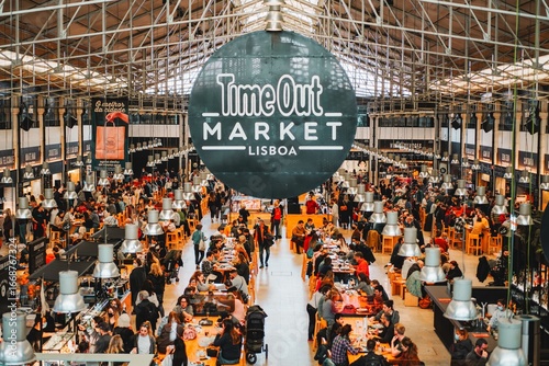 Busy interior of Time Out Market in Lisbon.