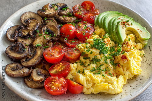 Healthy Breakfast Bowl with Scrambled Eggs, Vegetables, and Avocado