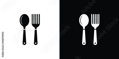 Spoon and Fork Cutlery Icons on Split Black and White Background Minimalist Style