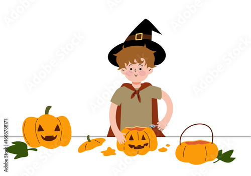 Boy in wizard costume carving Halloween pumpkins