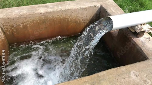 Water flowing into concrete drainage box
