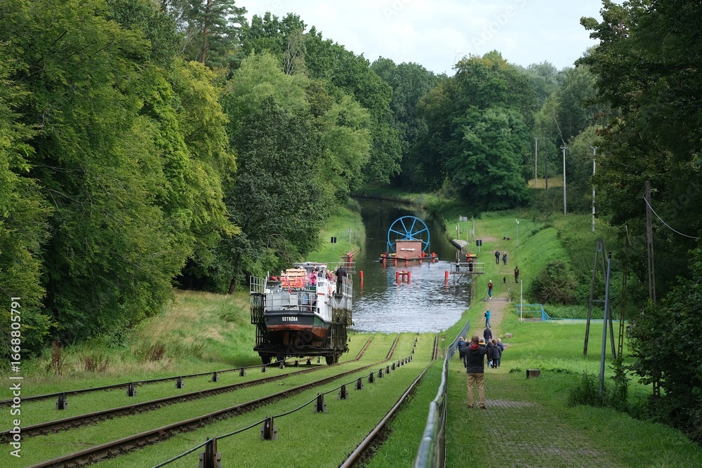 Fototapeta premium Buczyniec, Poland - Branched navigation system of Elblag Canal. Ships and yachts cross slipways on special trolleys. Inclined Planes and carriage