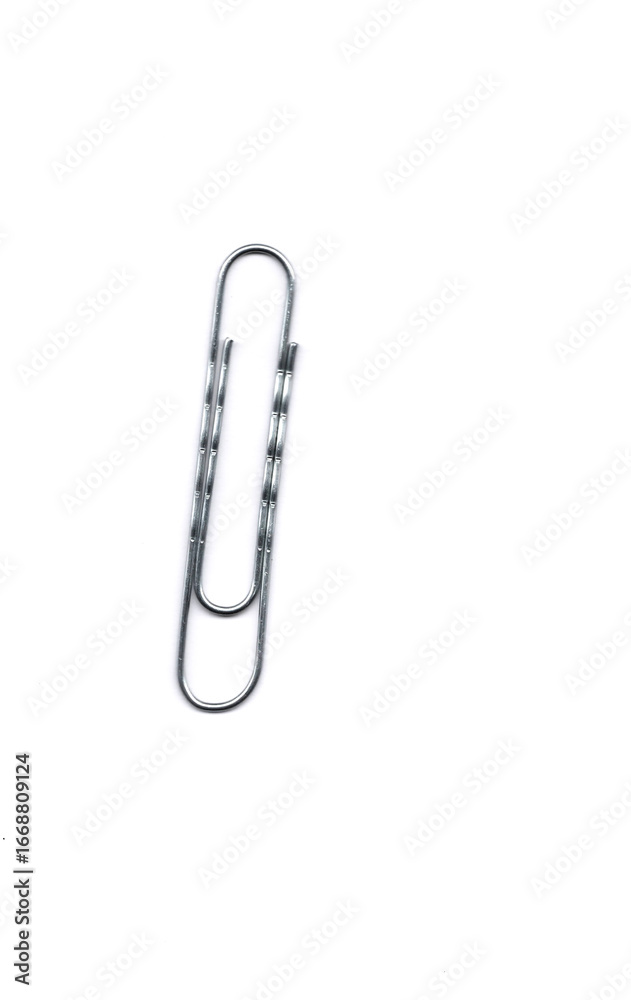 Obraz premium Paper clips on white background with text space