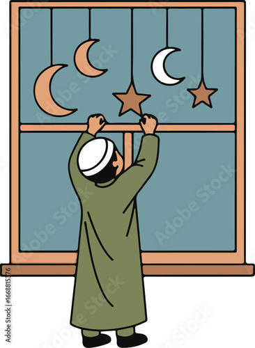 A man in a green thobe and white kufi cap hangs star and crescent moon decorations.