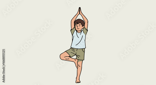 Young boy in casual clothes practicing the Vrikshasana yoga Tree Pose.