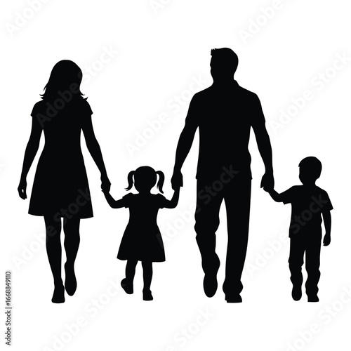 Silhouette of a happy family walking together holding hands parents and two children creating memories silhouette