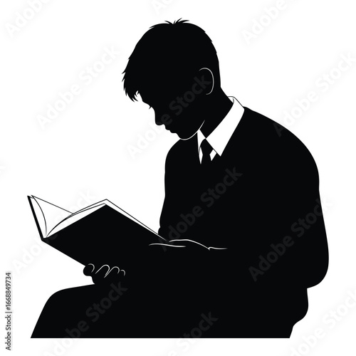 Silhouette of a young person deeply engaged in reading a book showing concentration and focus silhouette