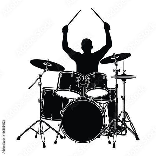 Silhouette of a drummer enthusiastically playing a drum set with raised drumsticks in dynamic action silhouette