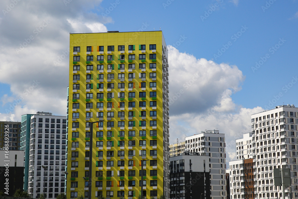 Naklejka premium Facades of houses in the new microdistrict called Buninskie Lugy (