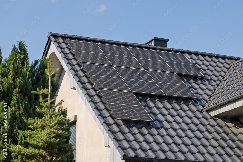 Fototapeta premium Solar panels on modern residential roof