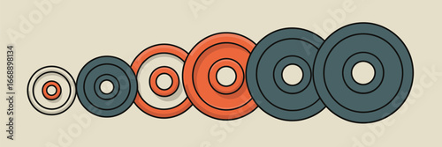 A row of six circular weight plates of varying sizes and colors arranged from smallest to largest
