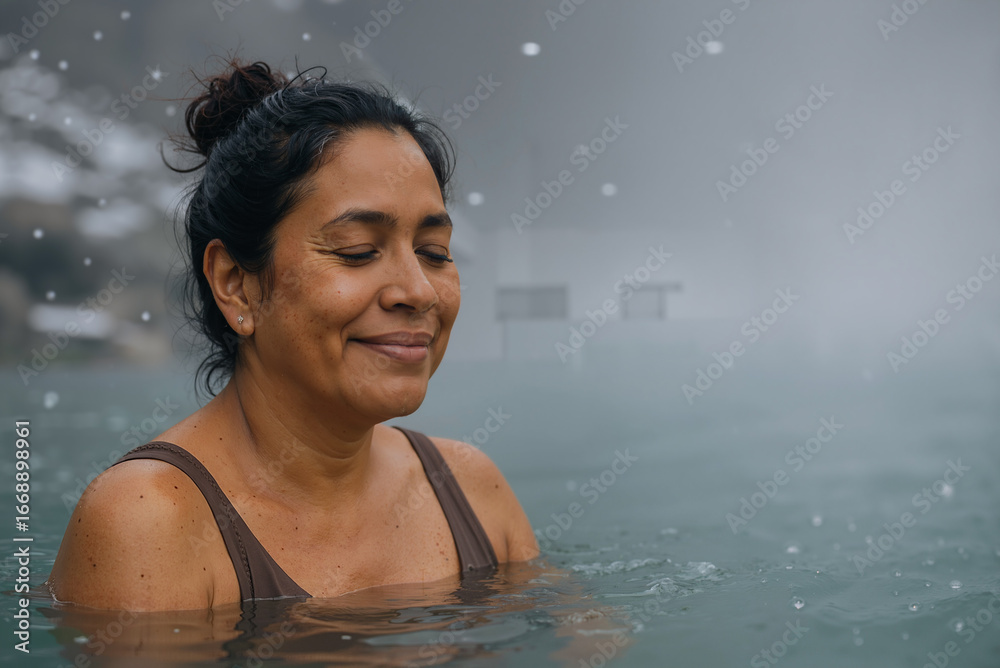 Fototapeta premium peaceful hispanic woman enjoying relaxation in a soothing hot spring amidst serene misty landscape