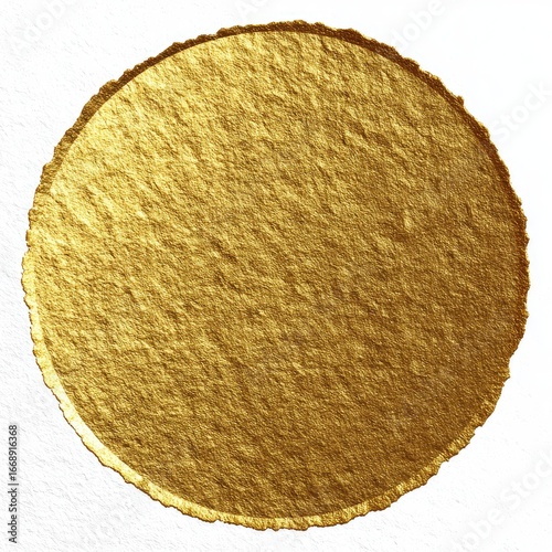 A textured, circular gold foil element with a rough, uneven edge, isolated on a white background