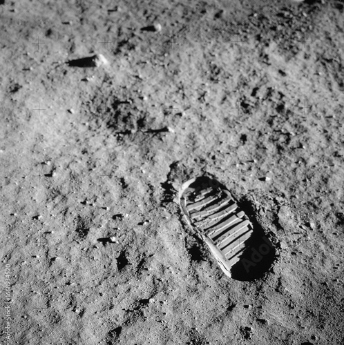 Fototapeta Naklejka Na Ścianę i Meble -  First step on the moon | Apollo program Lunar Surface Impression | Space Exploration, Human Footprint in Space
