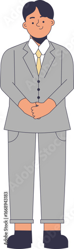 A formally dressed man in a grey suit with a yellow tie stands with his hands clasped.