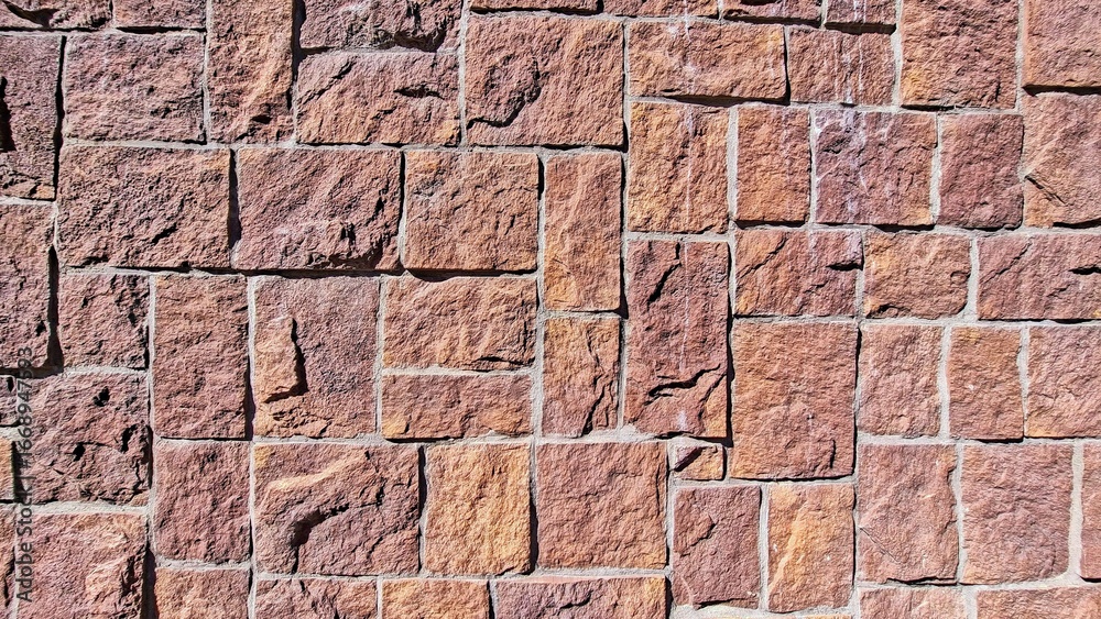Obraz premium Durable Rustic Stone Wall Design Constructed Unique Patterns Natural Textures