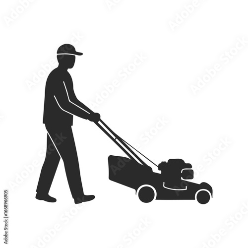 Silhouette of male pushing lawn mower