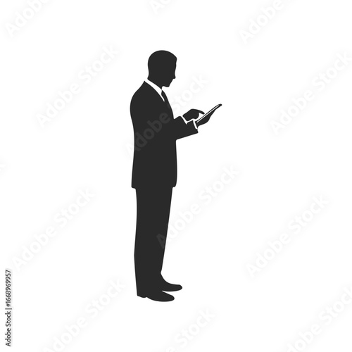 Silhouette of young african male in business attire holding tablet