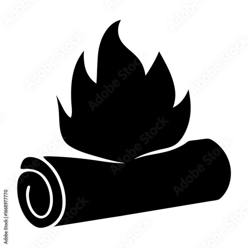 Silhouette image depicting campfire with logs burning bright in the night