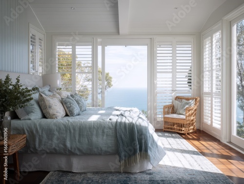 A bright, airy bedroom boas...