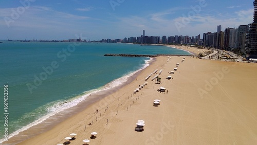 Aerial view of turquoise beach in Fortaleza, Ceará, Brazil. 