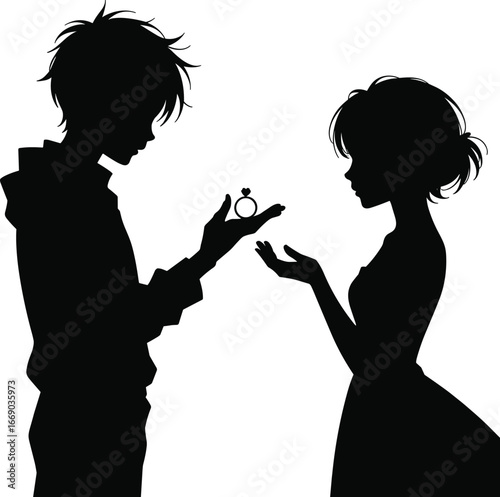 Young man proposes to woman with engagement ring silhouette