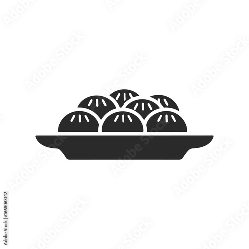 Black icon of dumplings on a plate