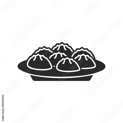 Black and white icon of dumplings on plate