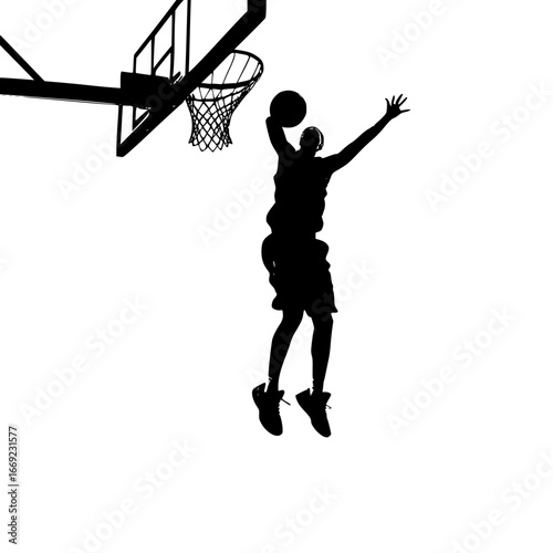 Silhouette of a basketball player jumping to dunk the ball in the hoop