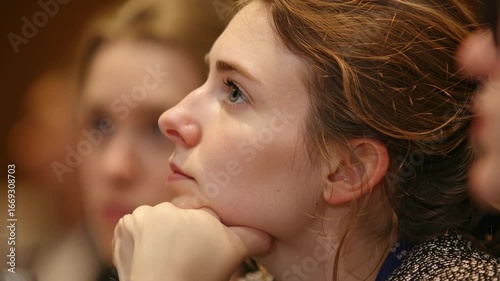 Woman Resting Chin on Hand, Profile View