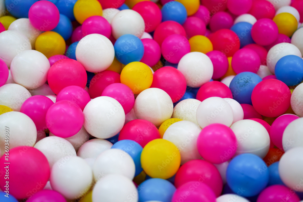A vibrant display of colorful spheres, creating a playful and cheerful abstract backdrop. Ideal for themes related to childhood fun, parties, and joyful celebrations, promoting a sense of amusement. A vibrant display of colorful spheres, creating a playful and cheerful abstract backdrop. Ideal for themes related to childhood fun, parties, and joyful celebrations, promoting a sense of amusement.