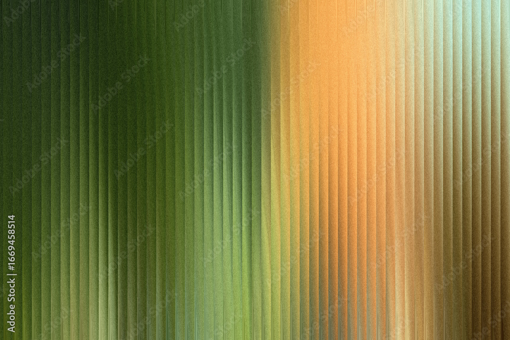 Obraz premium A textured abstract background features a gradient transition from deep green to warm orange, with vertical ribbed lines creating a sense of depth and movement