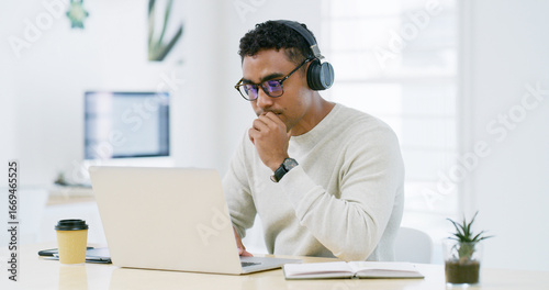 Listening, laptop and headphones with business man in office for learning, webinar or demo walkthrough. Policy training, online orientation or streaming with person in agency for professional upskill