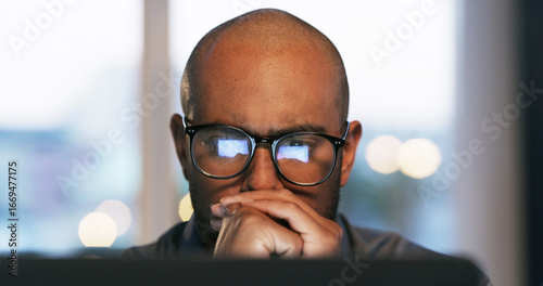 Photos Thinking, night or man in office for reading error, research or troubleshooting solution