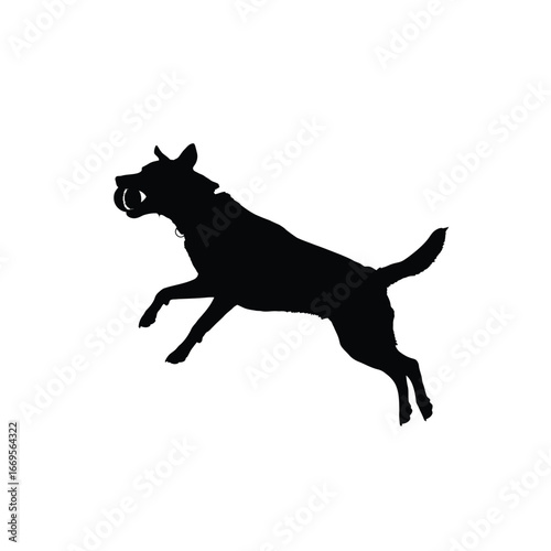 A black silhouette of a dog jumping in the air with its mouth open wide freely