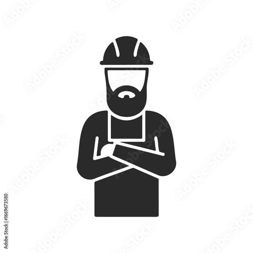 Silhouette of bearded male construction worker in hard hat and apron