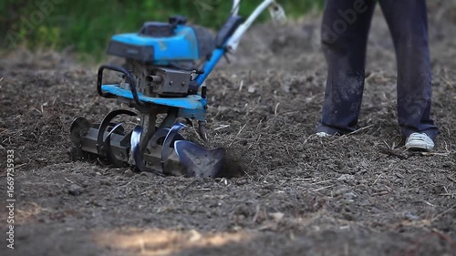 Wallpaper Mural Farmer Ploughing Soil on Agricultural Farmland. Torontodigital.ca