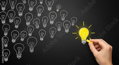 A bright, unique idea stands out from a multitude of ordinary concepts on a dark surface.