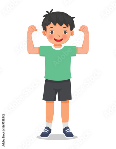 Little boy showing his strong muscle arm fist