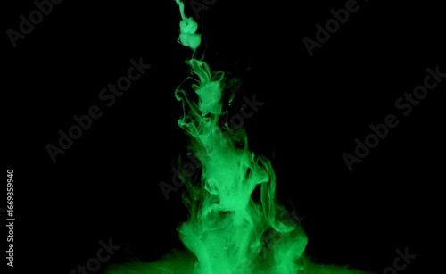 Green colorful dye on black background,Art abstract smoke texture,Colored liquid dye,Splash paint,Abstract color,Abstract Textures