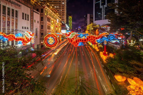 Chinatown in Singapore lights up during the Chinese New Year and Mid-Autumn Festival, creating a beautiful night scene in the city.