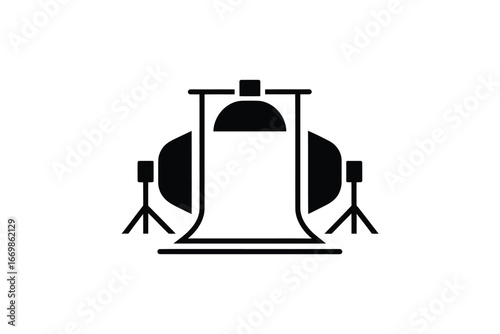 Professional photography studio setup with softbox lighting and backdrop stand