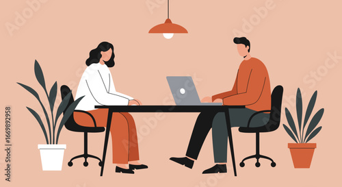 Two professionals collaborating at a desk in a modern office, one using a laptop. Ideal for business, teamwork, and communication concepts.