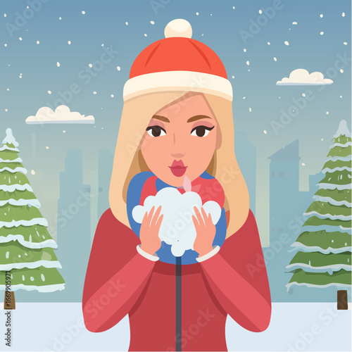 Beautiful isolated Christmas winter blonde girl puffing