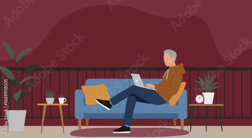 Man casually working on a laptop while relaxing on a sofa on a modern balcony or terrace. Ideal for remote work, freelance, or leisure lifestyle concepts.