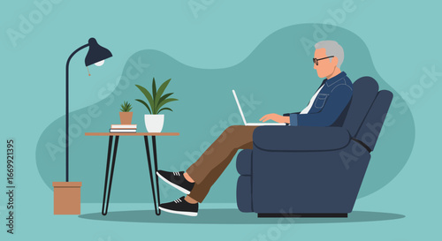 Elderly man comfortably using a laptop in a cozy armchair at home, depicting remote work, leisure, or modern senior lifestyle and technology adoption.