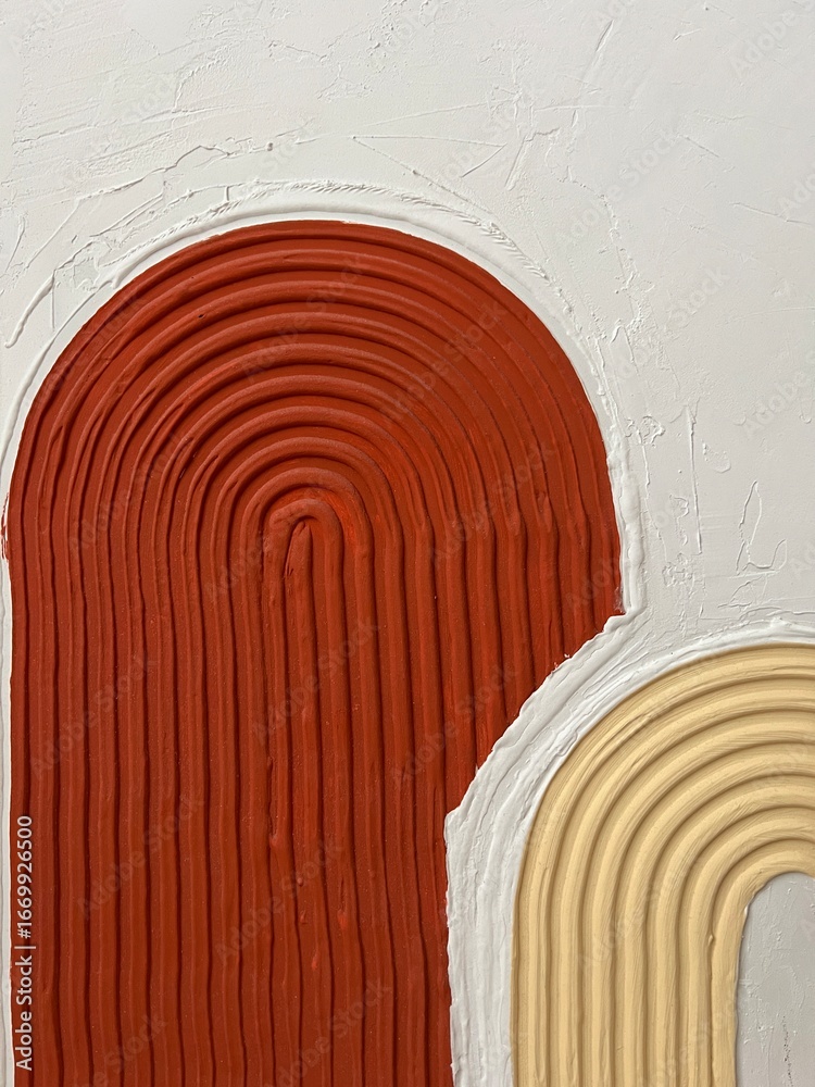 Naklejka premium A close-up of a handmade textured 3D abstract painting with raised curved lines in orange, beige, and white. This unique embossed artwork adds depth and dimension, making it a perfect statement piece