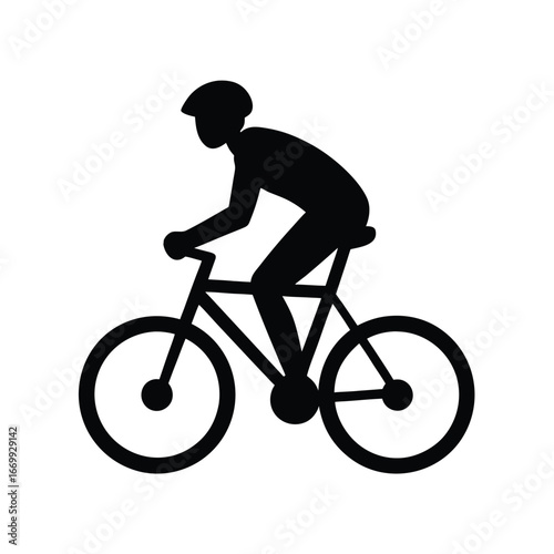 silhouette of a man riding a bicycle